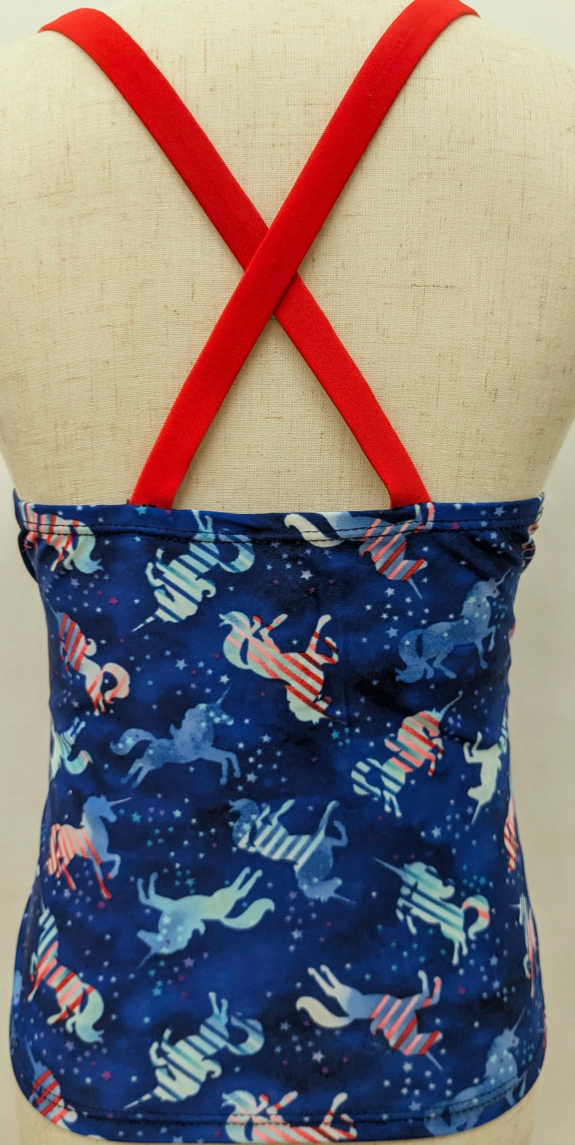 Wonder Nation 10/12 blue swim top w/ unicorns